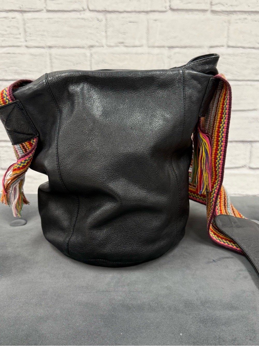 Black Leather Bohemian Bucket Bag with Colorful Woven Strap